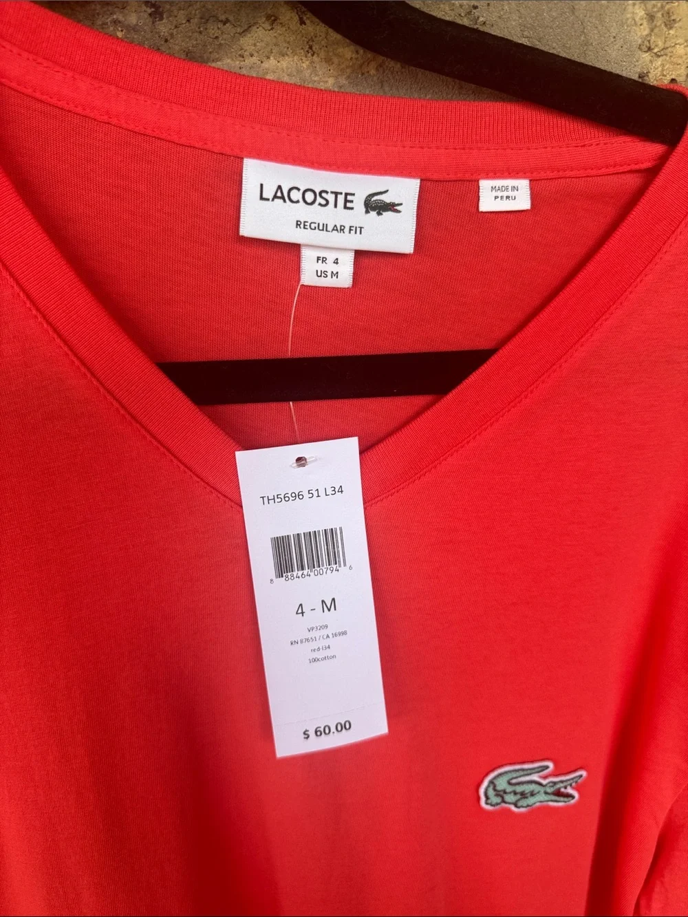 Lacoste Men’s V-Neck Tee in Coral